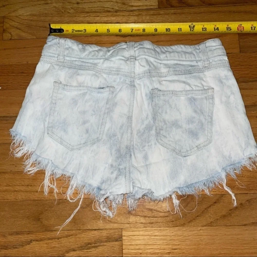 Light wash jean denim cutoff /Distressed Rewash Jean Shorts/frayed denim shorts